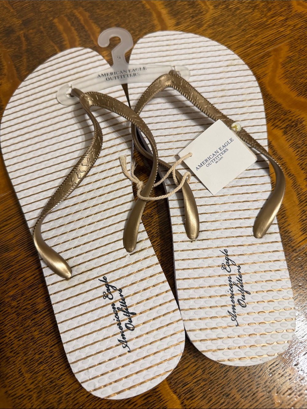 American Eagle Outfitters White and Metallic Gold Flip Flops